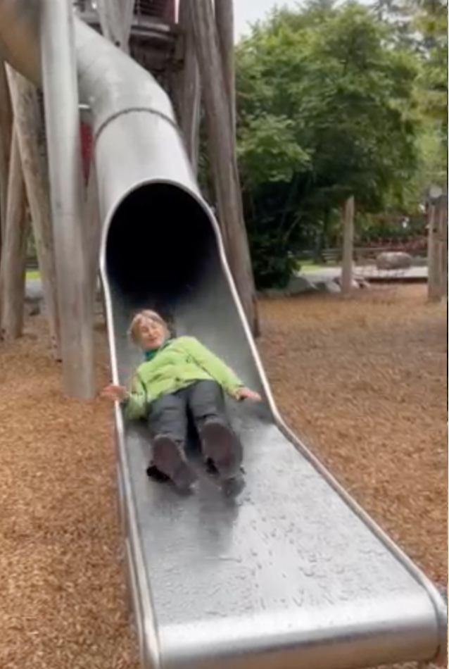 Jan emerges from the slide