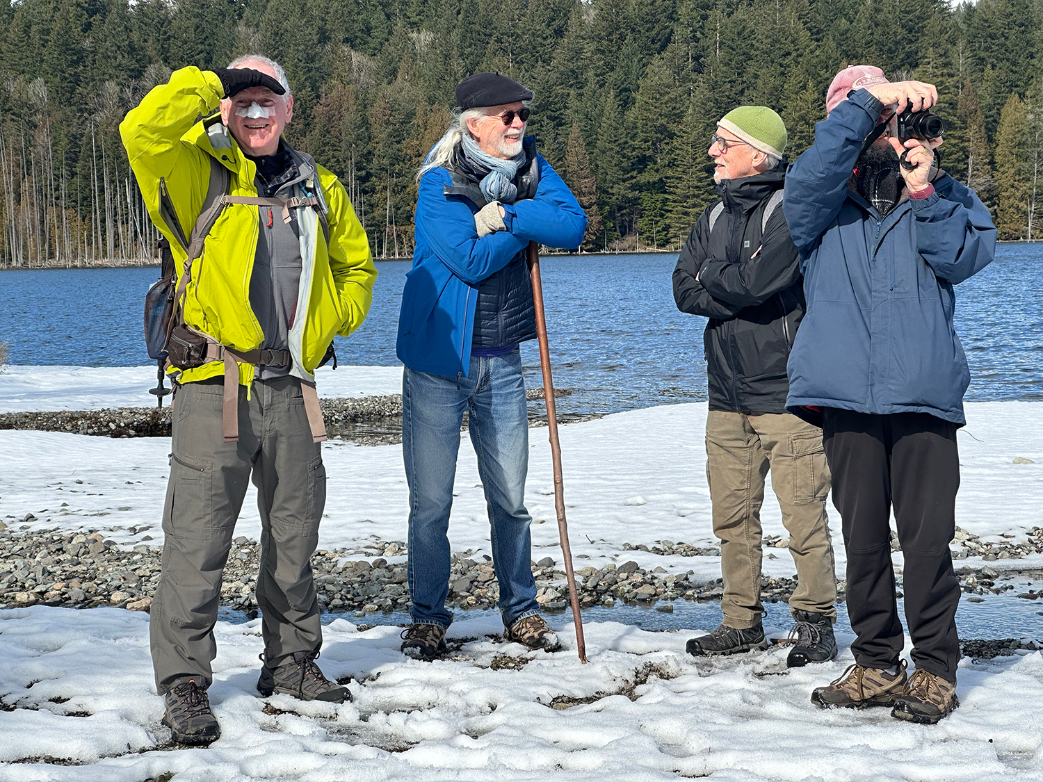 Four men by the lake