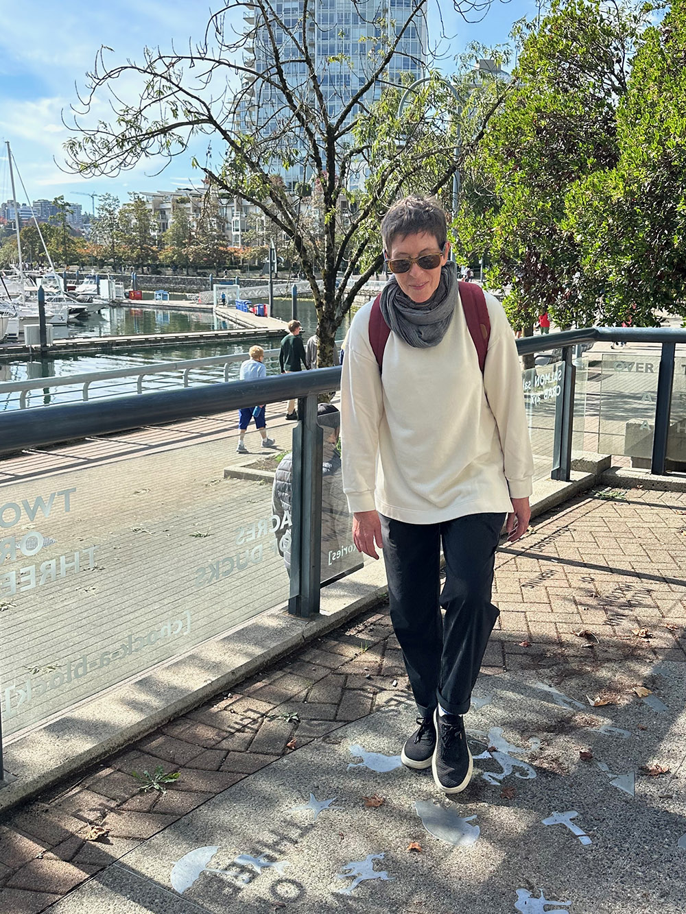 Carrie checks the sidewalk