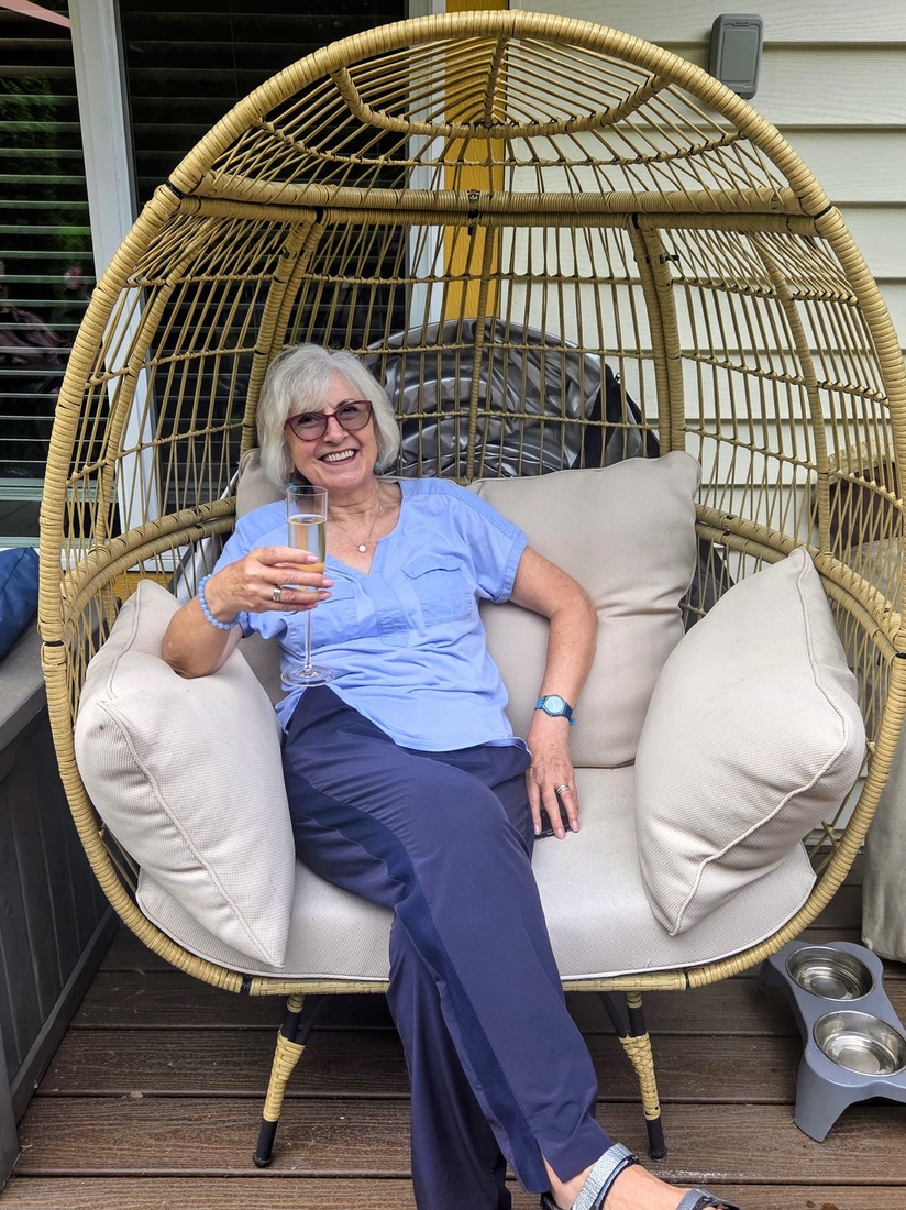 Angela in the wicker chair